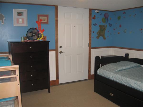 39 Griffin Street Springfield, MA 01104 - Photo 18 of 20 a bedroom with a bed and painting on the wall