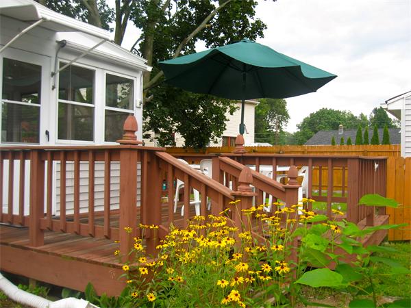 39 Griffin Street Springfield, MA 01104 - Photo 3 of 20 a view of a chairs and table under an umbrella