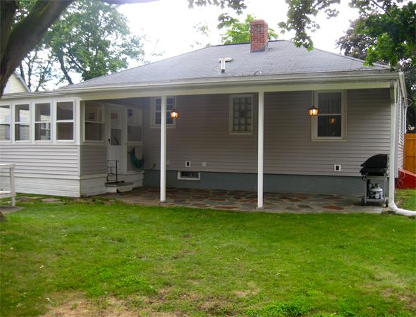 39 Griffin Street Springfield, MA 01104 - Photo 4 of 20 a view of a house with a backyard