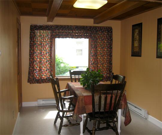 39 Griffin Street Springfield, MA 01104 - Photo 7 of 20 a view of a dining room with furniture and window