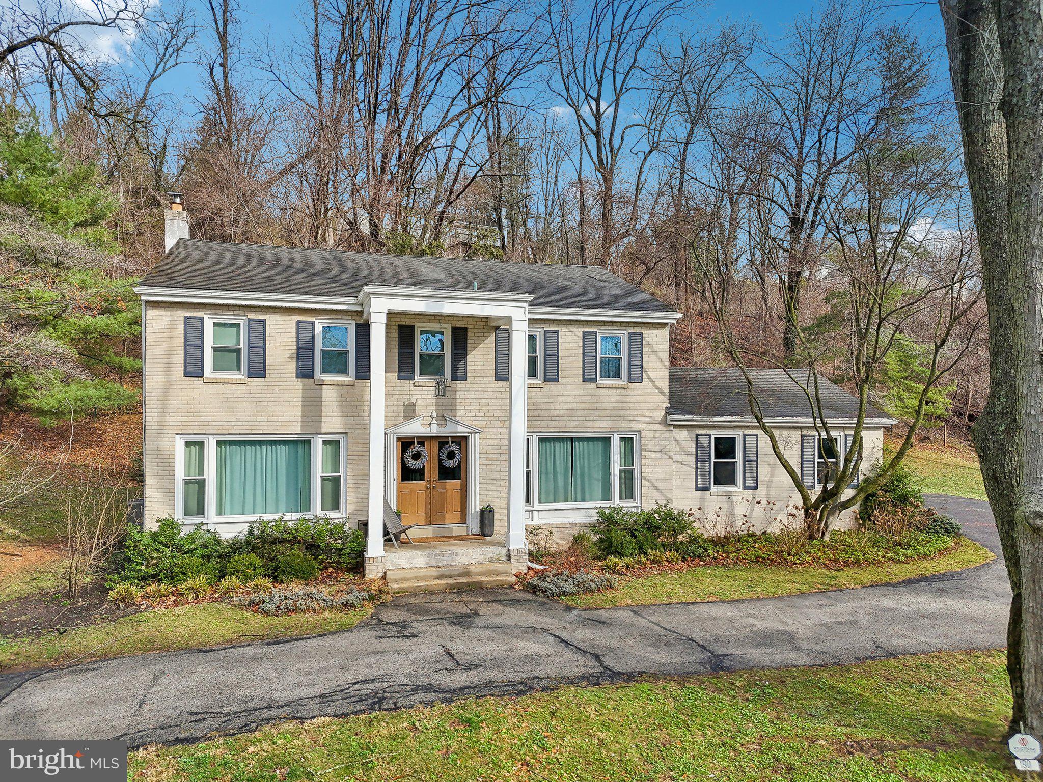 190 Upper Gulph Road Radnor, PA 19087 - Photo 2 of 54 a front view of a house with a yard