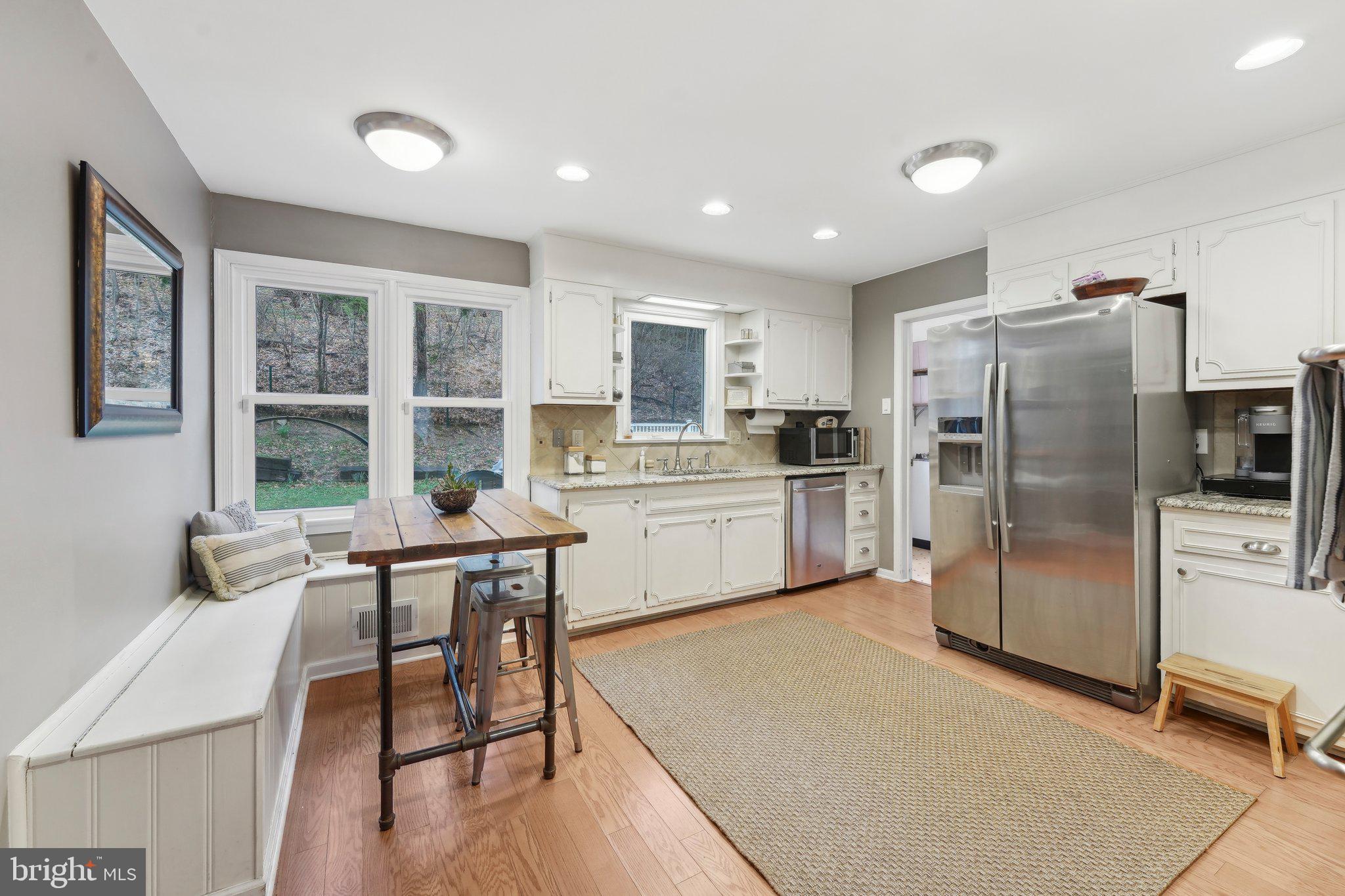 190 Upper Gulph Road Radnor, PA 19087 - Photo 21 of 54 a kitchen with refrigerator cabinets and large window