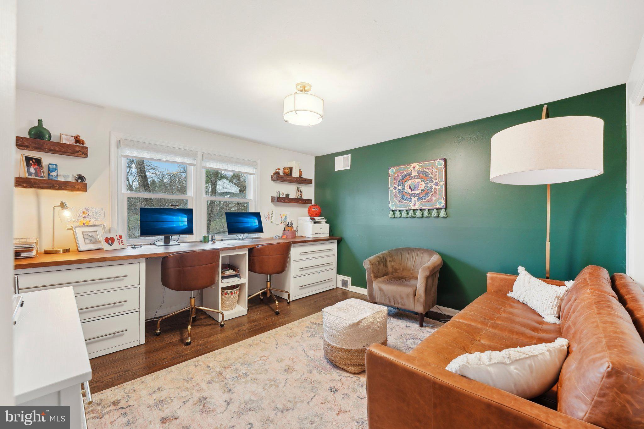 190 Upper Gulph Road Radnor, PA 19087 - Photo 33 of 54 a living room with furniture a rug and a window