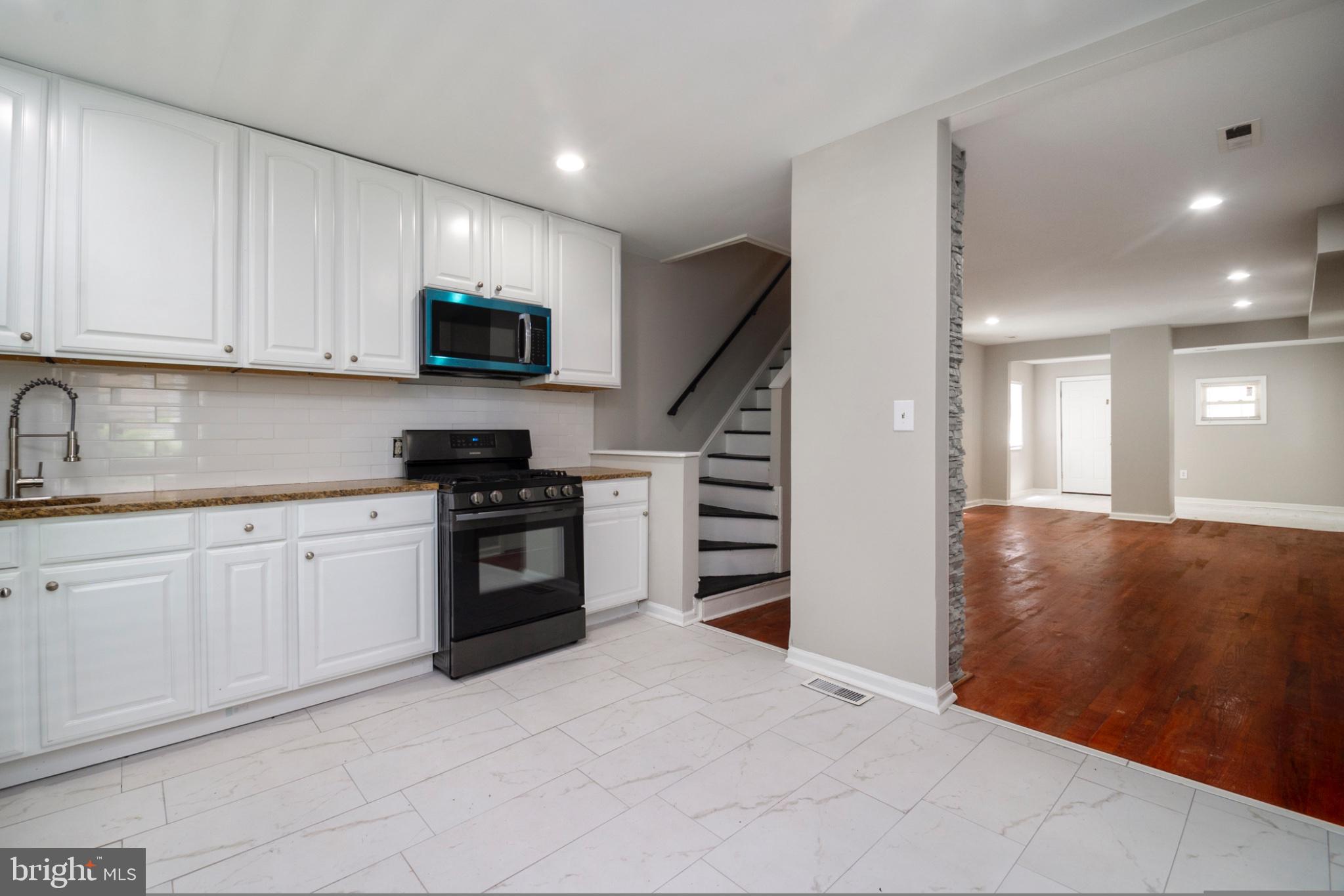 3708 7th Street Baltimore, MD 21225 - Photo 4 of 8 Modern kitchen with sleek finishes.
