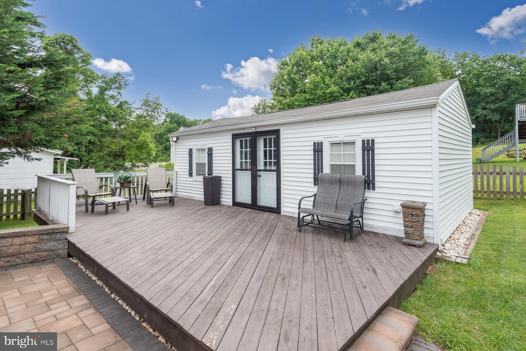20 Ritters Lane Owings Mills, MD 21117 - Photo 26 of 28 Large Pool House with relaxing deck