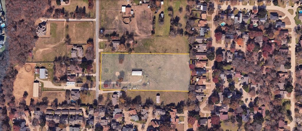 1409 Stapleton Street Flower Mound, TX 75028 - Photo 2 of 4 a aerial view of a house with a yard