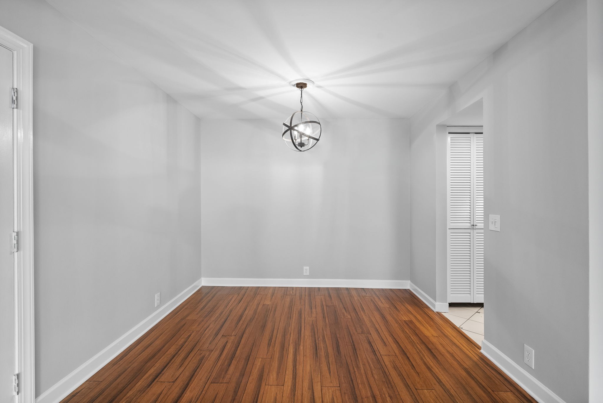 21 Vaughns Gap Road Nashville, TN 37205 - Photo 11 of 27 a view of a room with wooden floor and fan