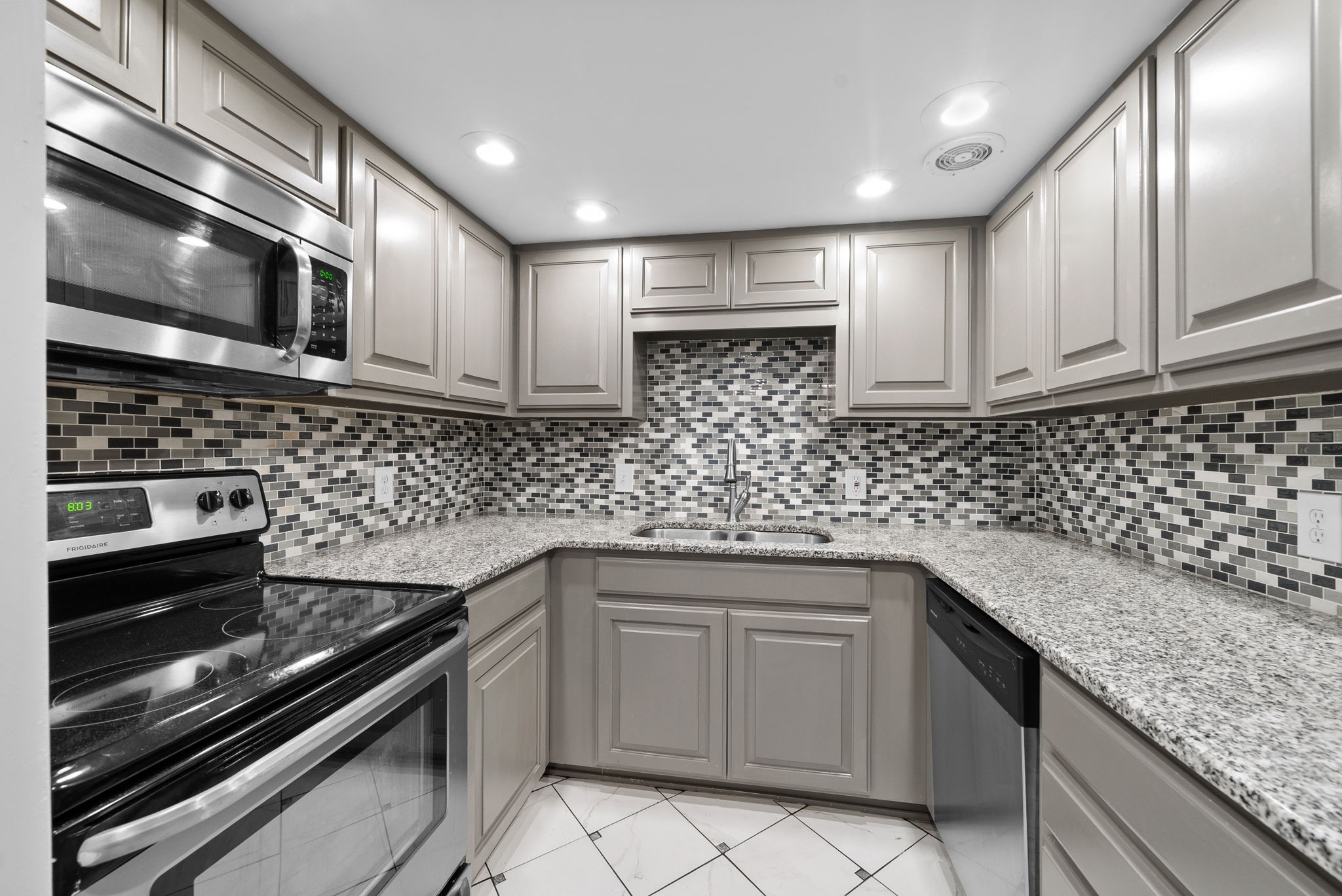21 Vaughns Gap Road Nashville, TN 37205 - Photo 7 of 27 a kitchen with granite countertop a sink stainless steel appliances and cabinets