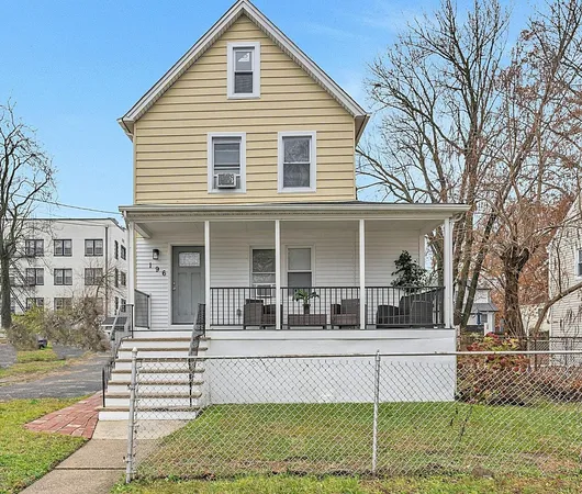 a view of a house with a porch