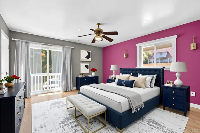 a view of a big yard with flower plants and wooden fence