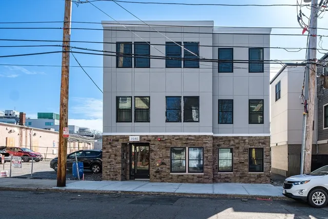 a tall building with a outdoor space