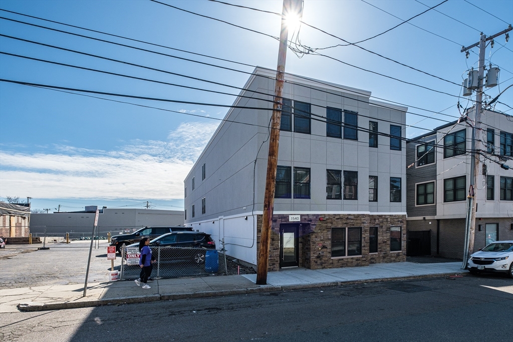 1540 North Shore Road, Unit 202 Revere, MA 02151 - Photo 18 of 19 a view of a car park in front of a building