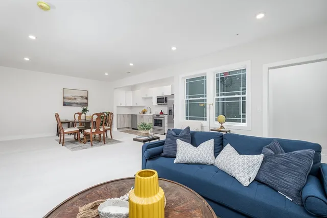a living room with furniture and a couch