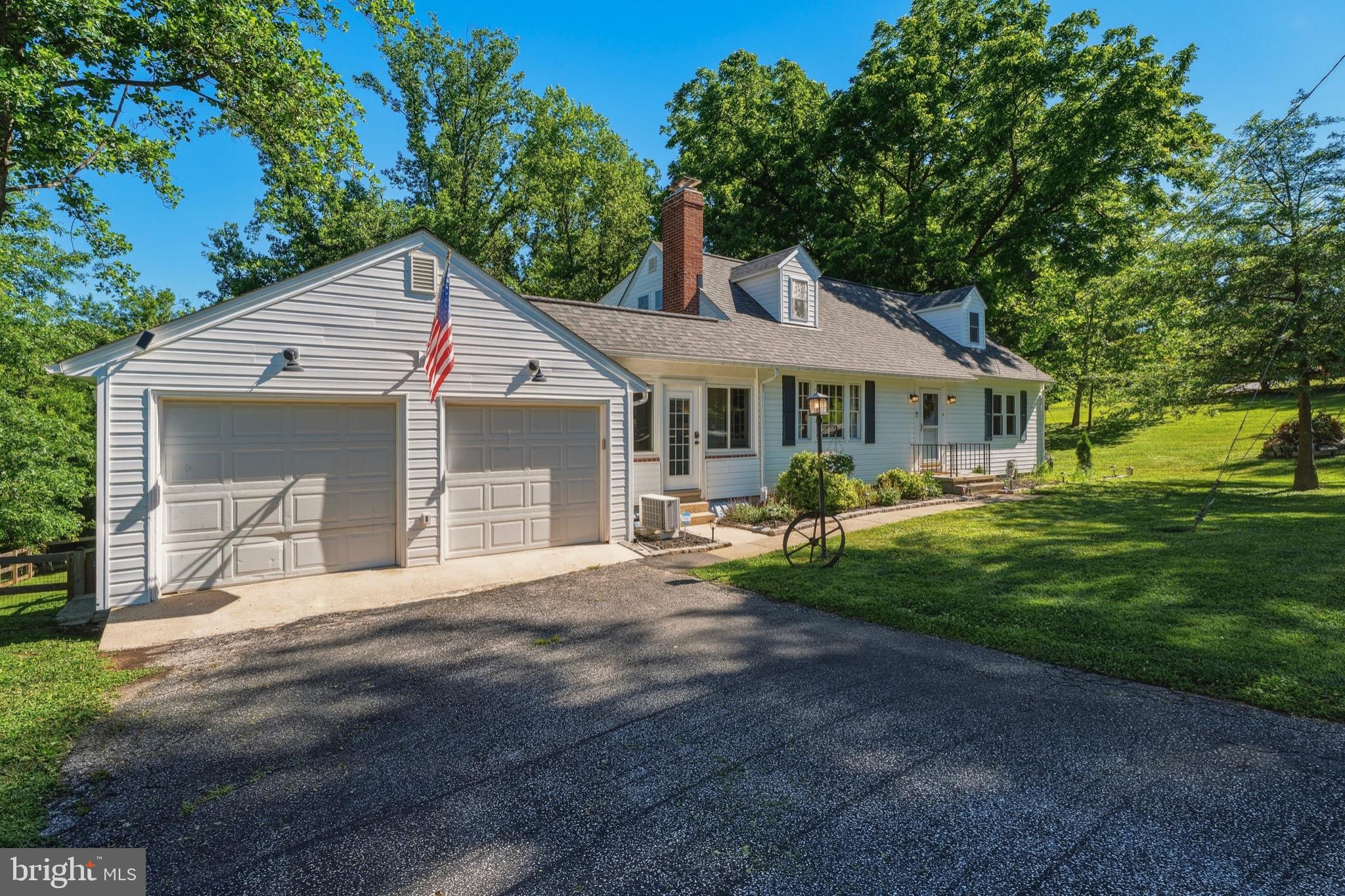 1102 Greenway Road Cockeysville, MD 21030 - Photo 45 of 47 Charming home nestled in lush greenery.