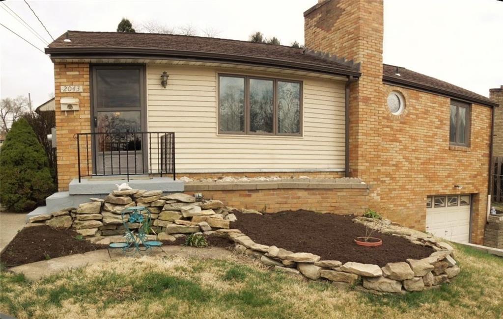 2043 Borland Road Pittsburgh, PA 15243 - Photo 22 of 24 Stone wall planter area great for a flower bed + fresh mulch.