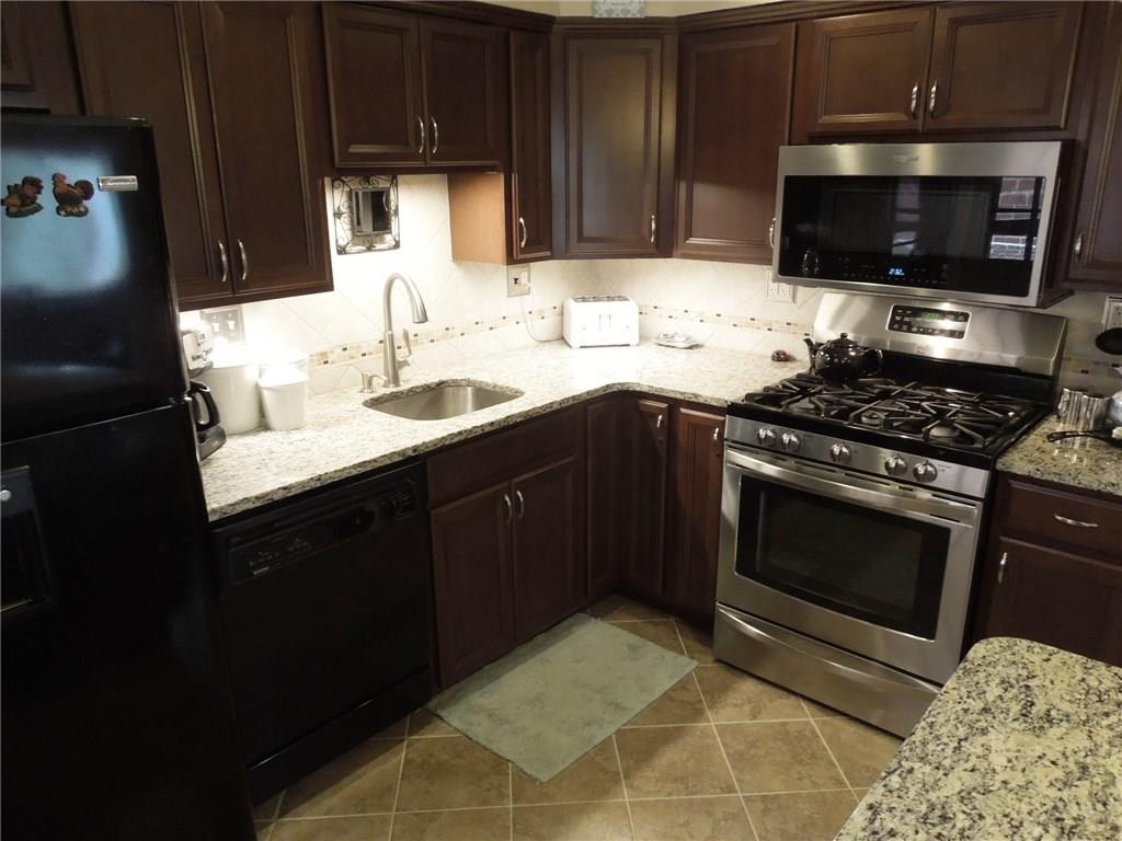 2043 Borland Road Pittsburgh, PA 15243 - Photo 6 of 24 New gourmet kitchen 2017 - granite counter tops, ceramic tile floors and back splash. Nice appliances!