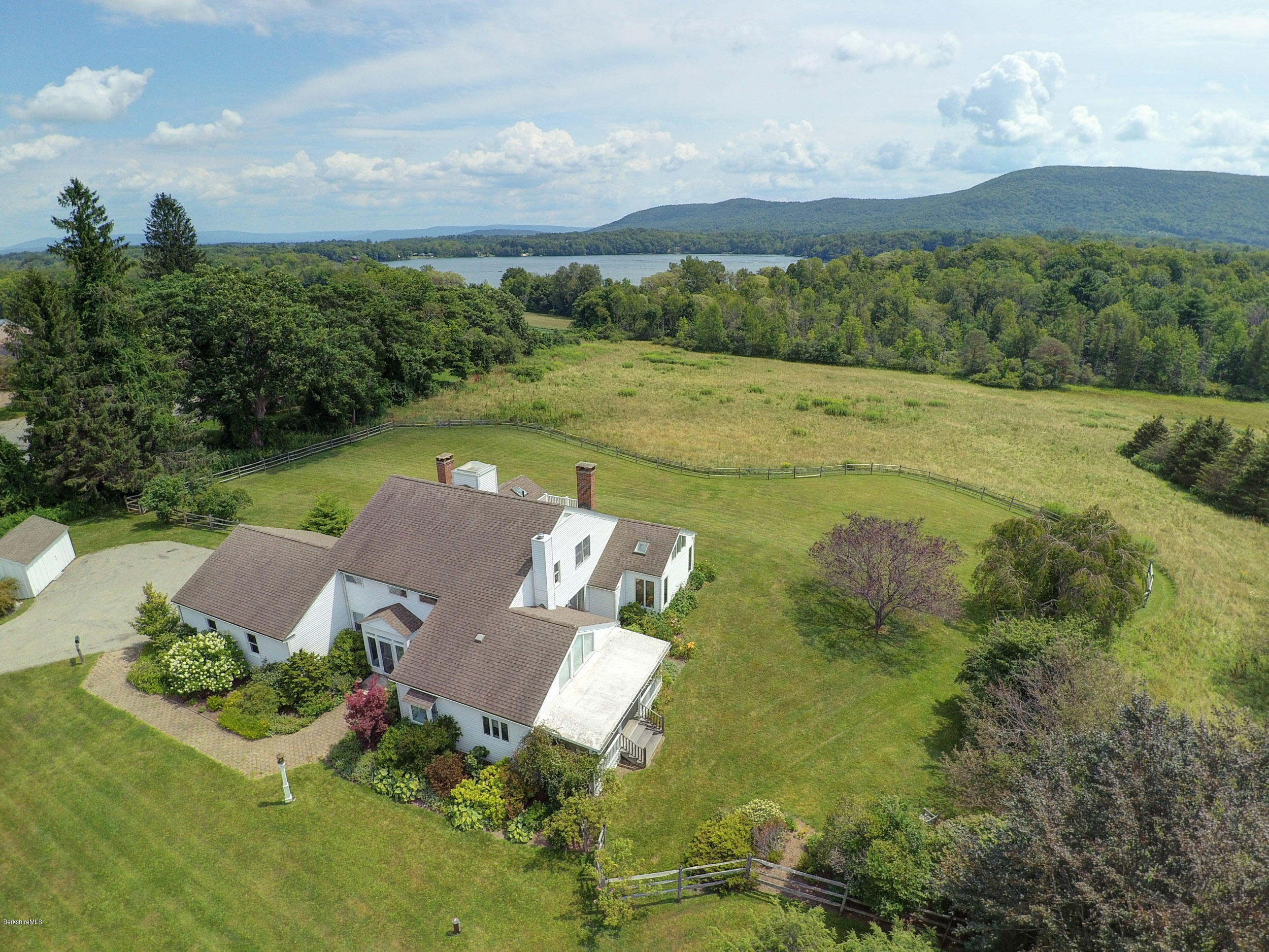 123 State Road Richmond, MA 01201 - Photo 2 of 32 a view of a lake with a yard
