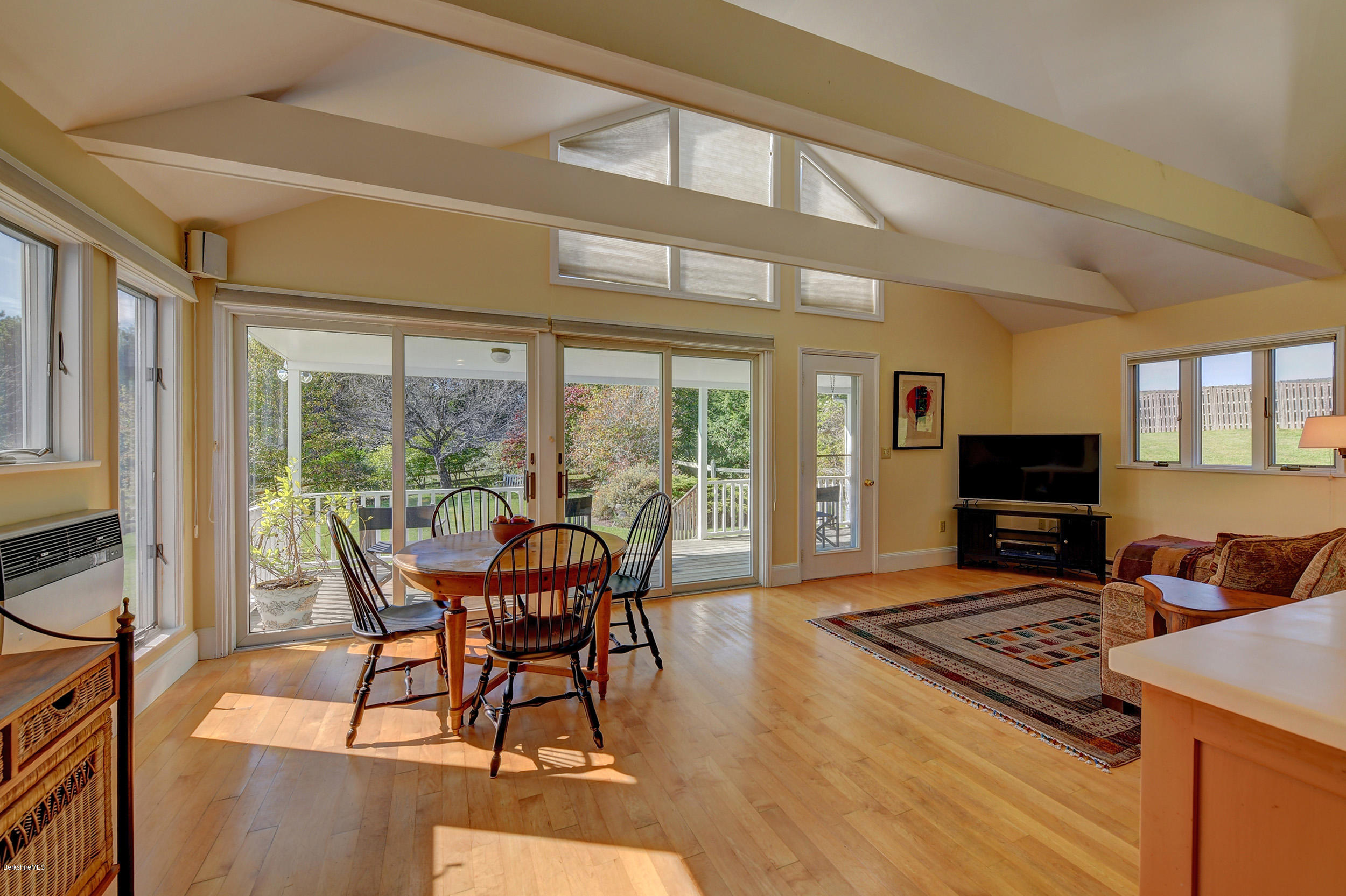 123 State Road Richmond, MA 01201 - Photo 12 of 32 a view of a dining room with furniture window and wooden floor