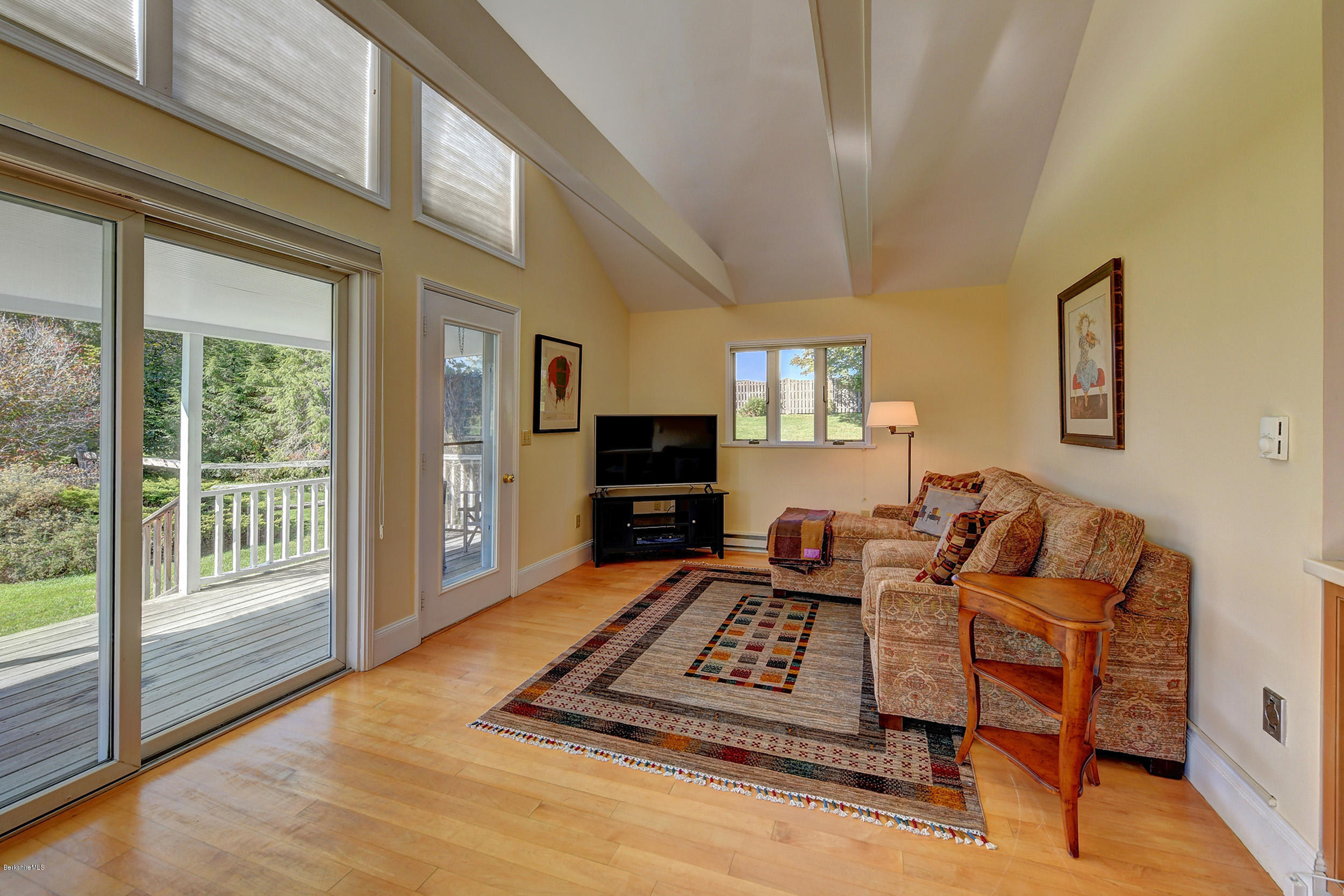 123 State Road Richmond, MA 01201 - Photo 13 of 32 a living room with furniture and a fireplace