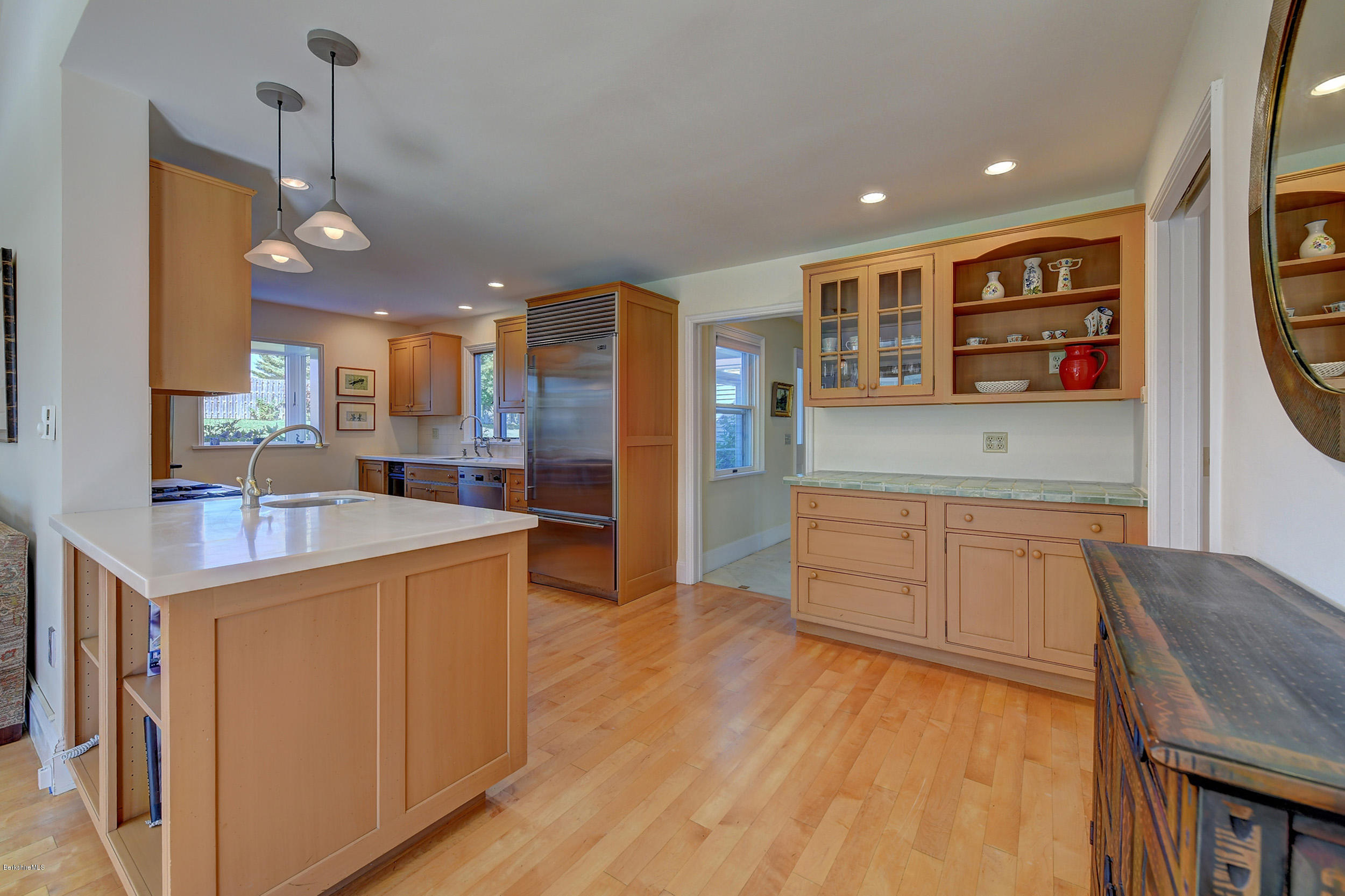 123 State Road Richmond, MA 01201 - Photo 16 of 32 a kitchen with stainless steel appliances granite countertop a sink a stove and a wooden floors