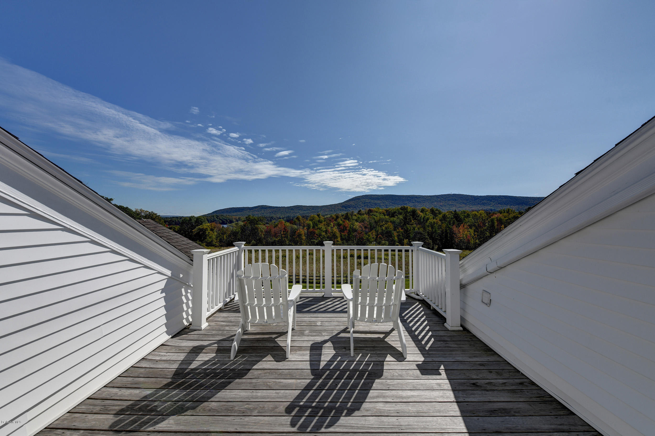 123 State Road Richmond, MA 01201 - Photo 22 of 32 a view of balcony with wooden floor and city view
