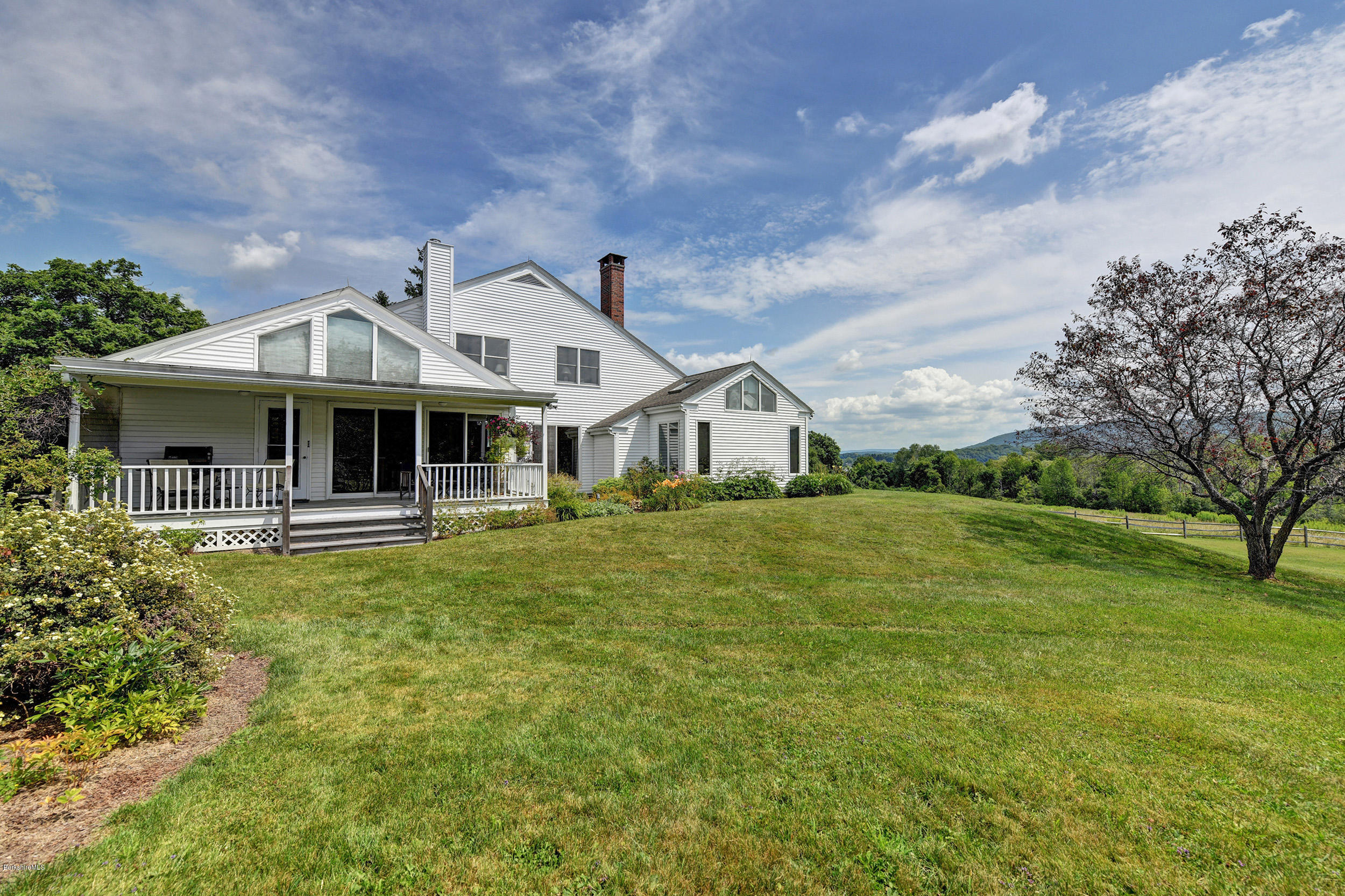 123 State Road Richmond, MA 01201 - Photo 27 of 32 a front view of a house with garden