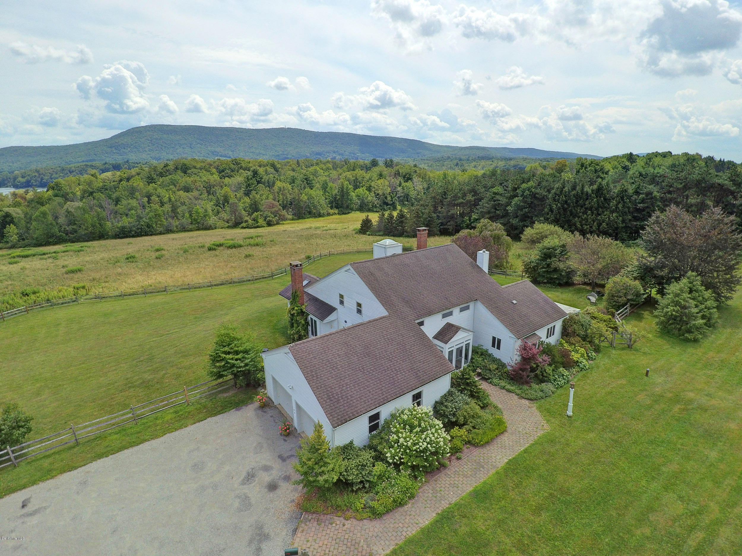 123 State Road Richmond, MA 01201 - Photo 30 of 32 an aerial view of a house with garden space and ocean view in back