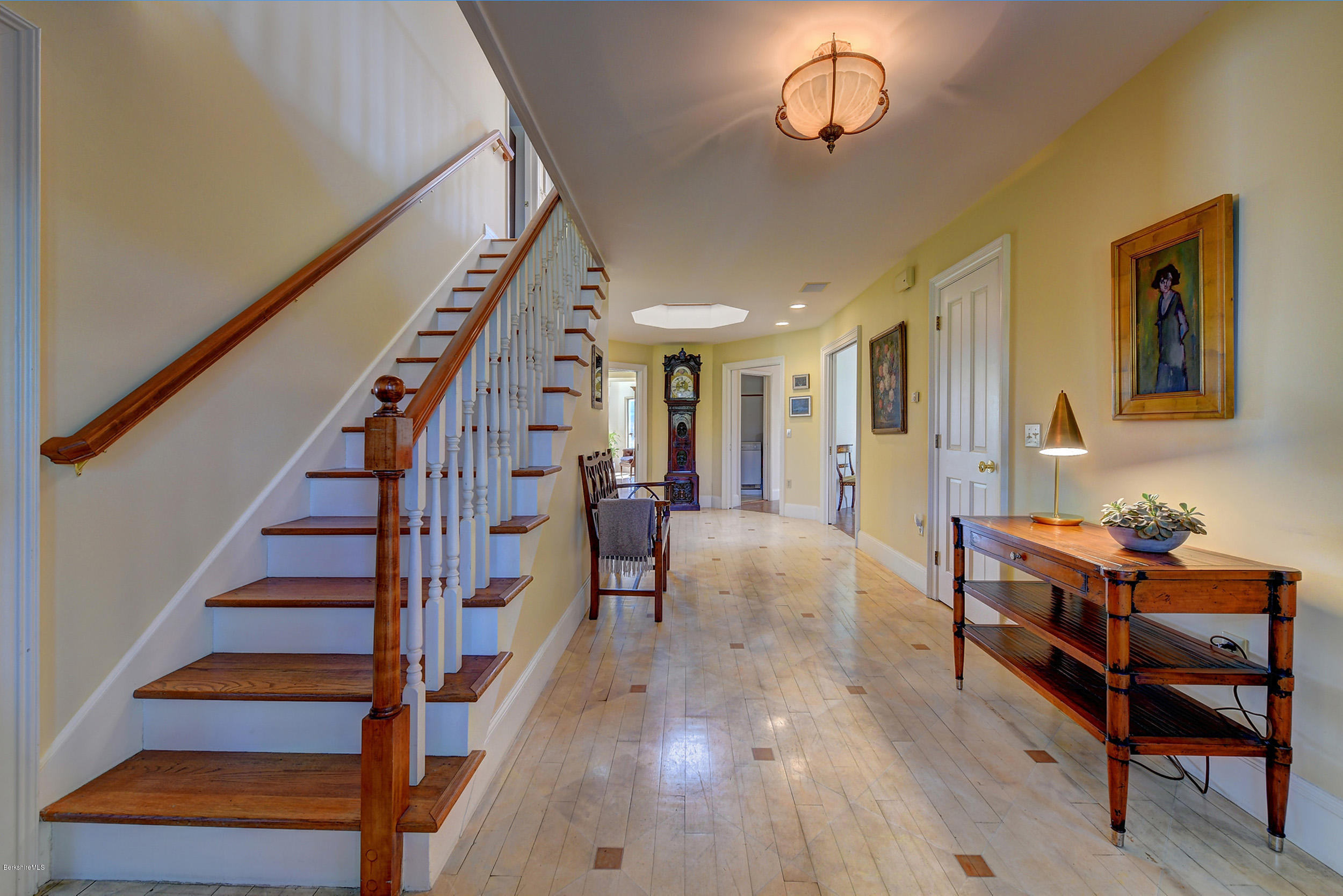 123 State Road Richmond, MA 01201 - Photo 4 of 32 a furnished livingroom and entryway with wooden floor