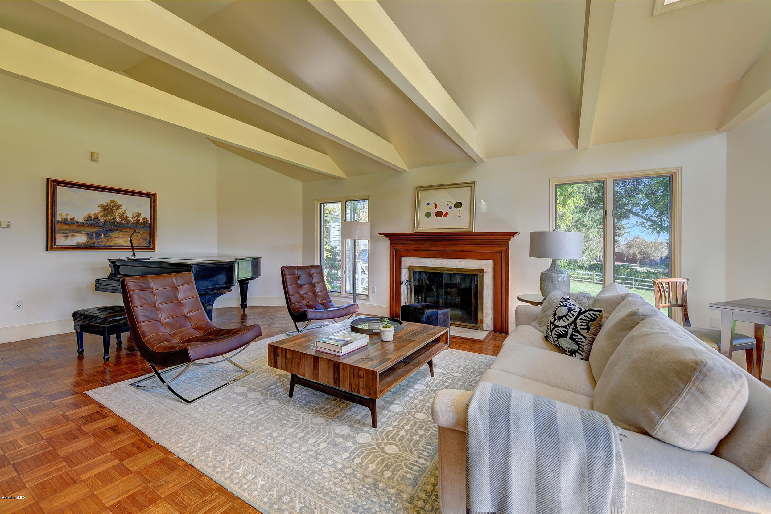 123 State Road Richmond, MA 01201 - Photo 6 of 32 a living room with furniture and a fireplace