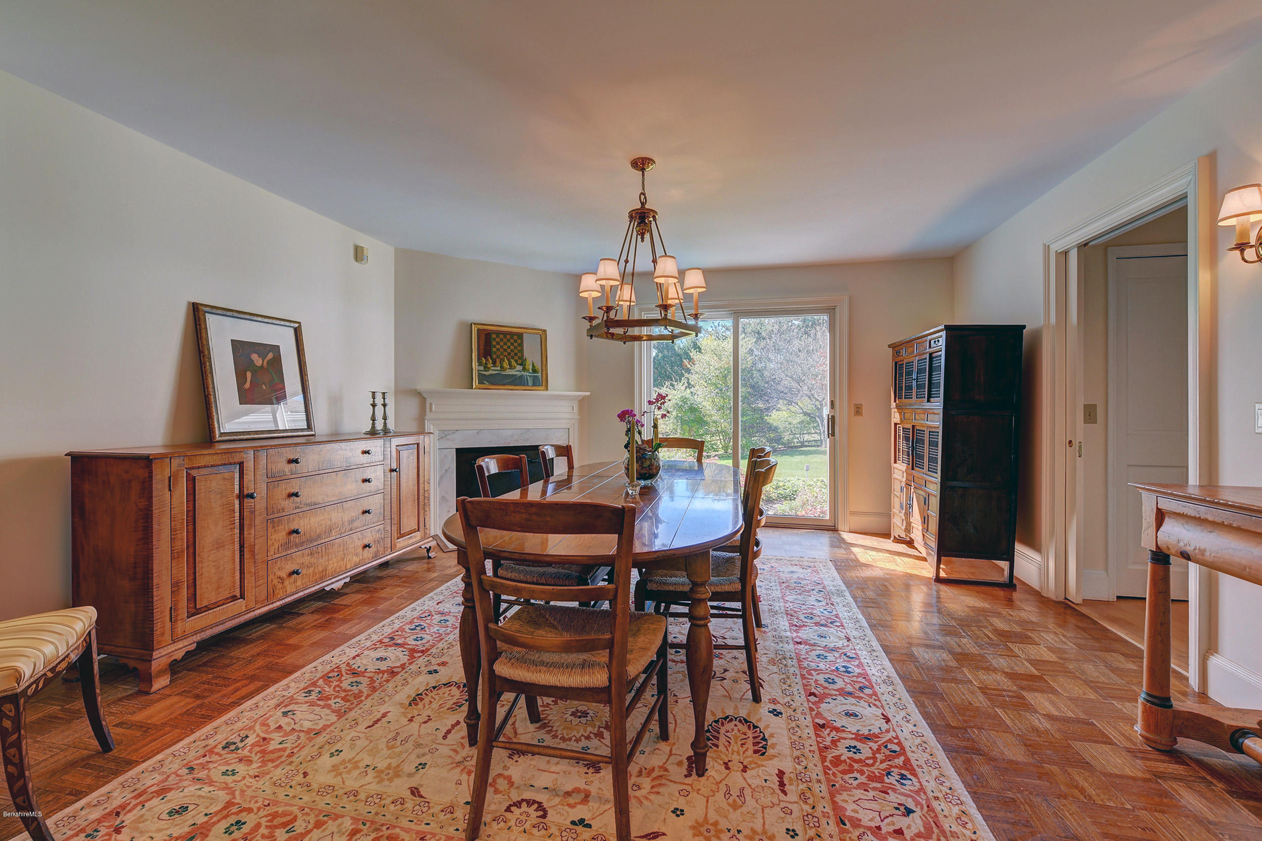 123 State Road Richmond, MA 01201 - Photo 9 of 32 a view of a dining room with furniture window and wooden floor