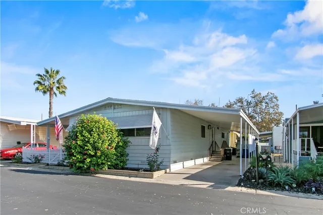a front view of a house with a garage