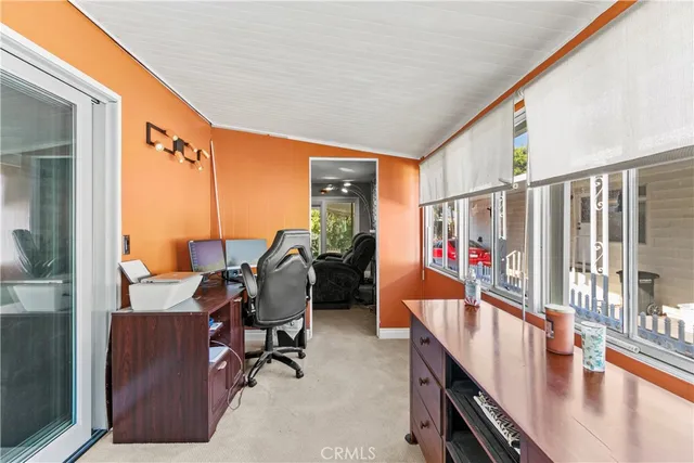 a view of a hallway with workspace