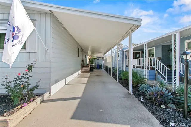 a view of a swimming pool and a chair