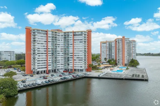 a view of a city with tall buildings