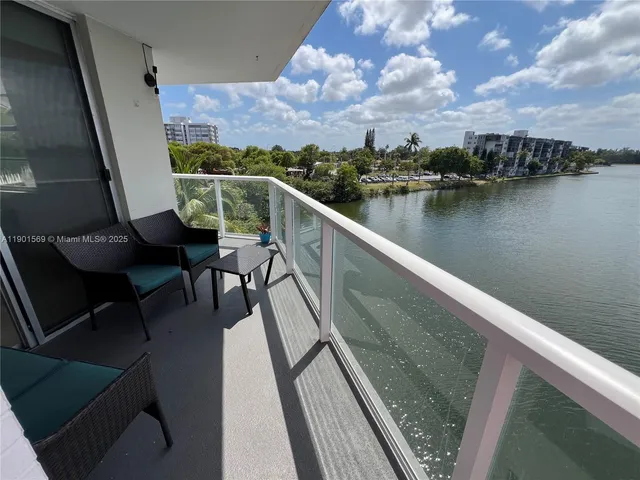 a view of a lake from a balcony