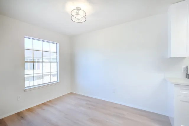 an empty room with windows