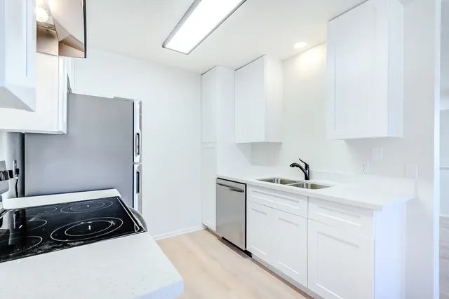 a view of empty room with windows