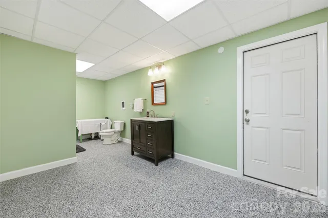 a view of a livingroom with a furniture