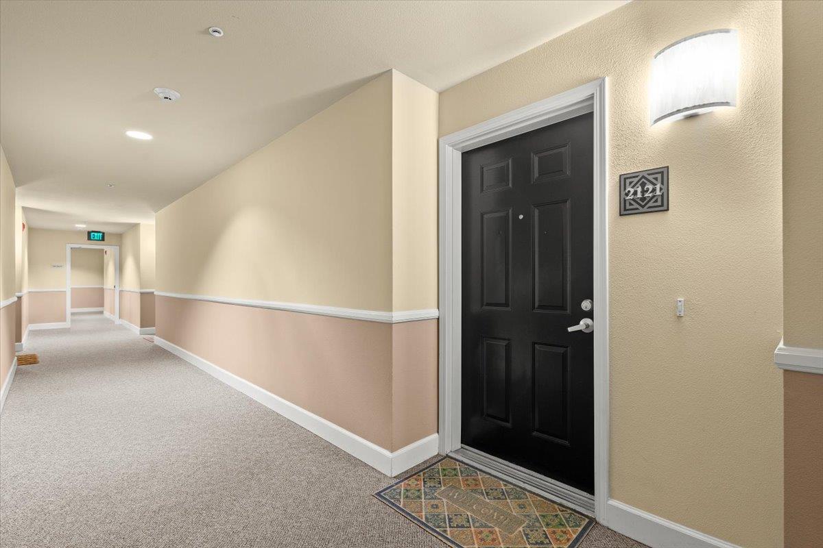 a view of hallway with walk in closet