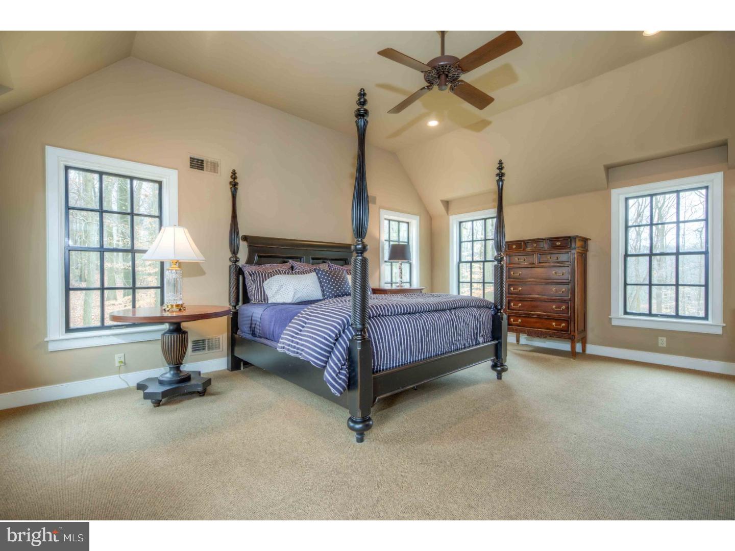 2 Dewitt Lane Wayne, PA 19087 - Photo 11 of 25 a bedroom with a bed and a large window
