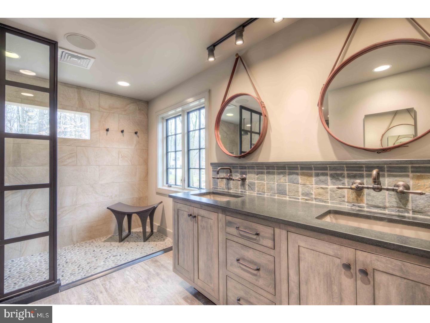 2 Dewitt Lane Wayne, PA 19087 - Photo 13 of 25 a bathroom with a sink and a mirror