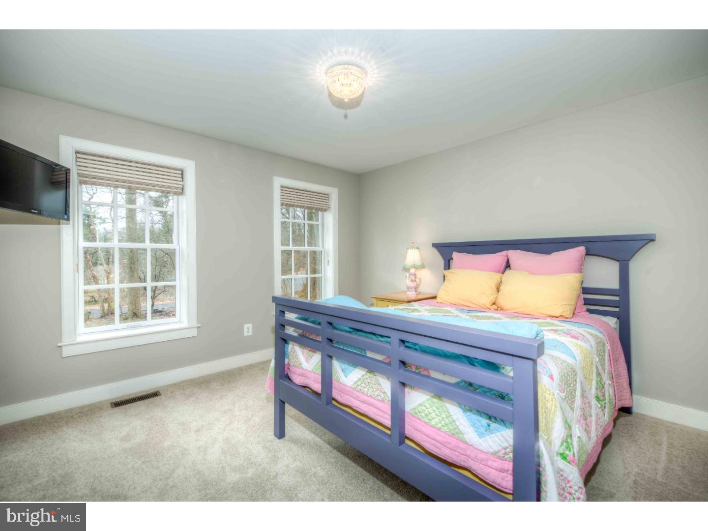 2 Dewitt Lane Wayne, PA 19087 - Photo 14 of 25 a bedroom with a bed and a window
