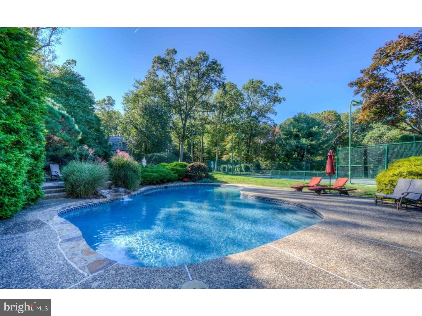 2 Dewitt Lane Wayne, PA 19087 - Photo 22 of 25 a view of a backyard with swimming pool