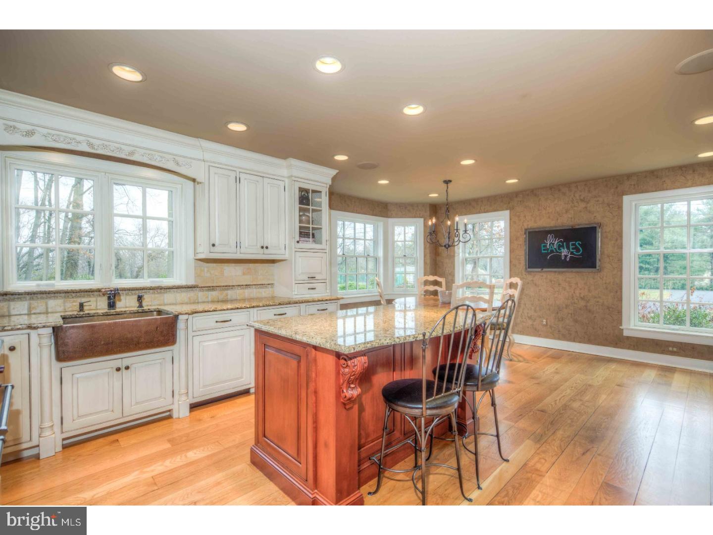 2 Dewitt Lane Wayne, PA 19087 - Photo 5 of 25 a large kitchen with a table and chairs