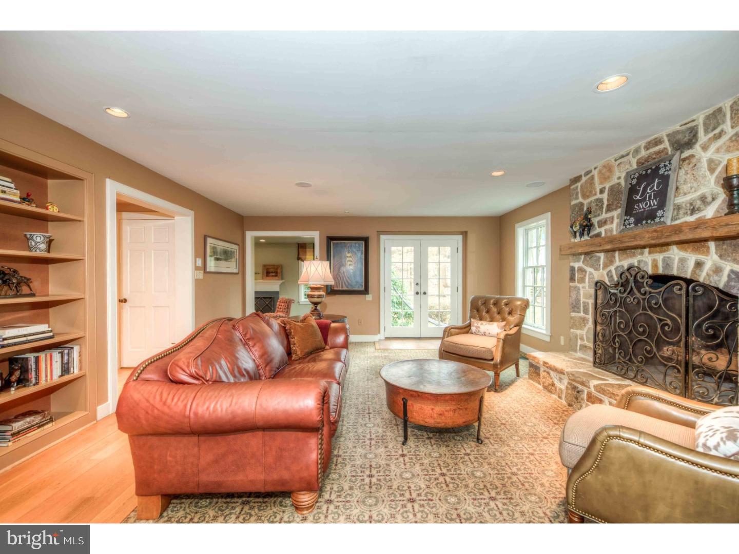 2 Dewitt Lane Wayne, PA 19087 - Photo 7 of 25 a living room with furniture a rug and a large window