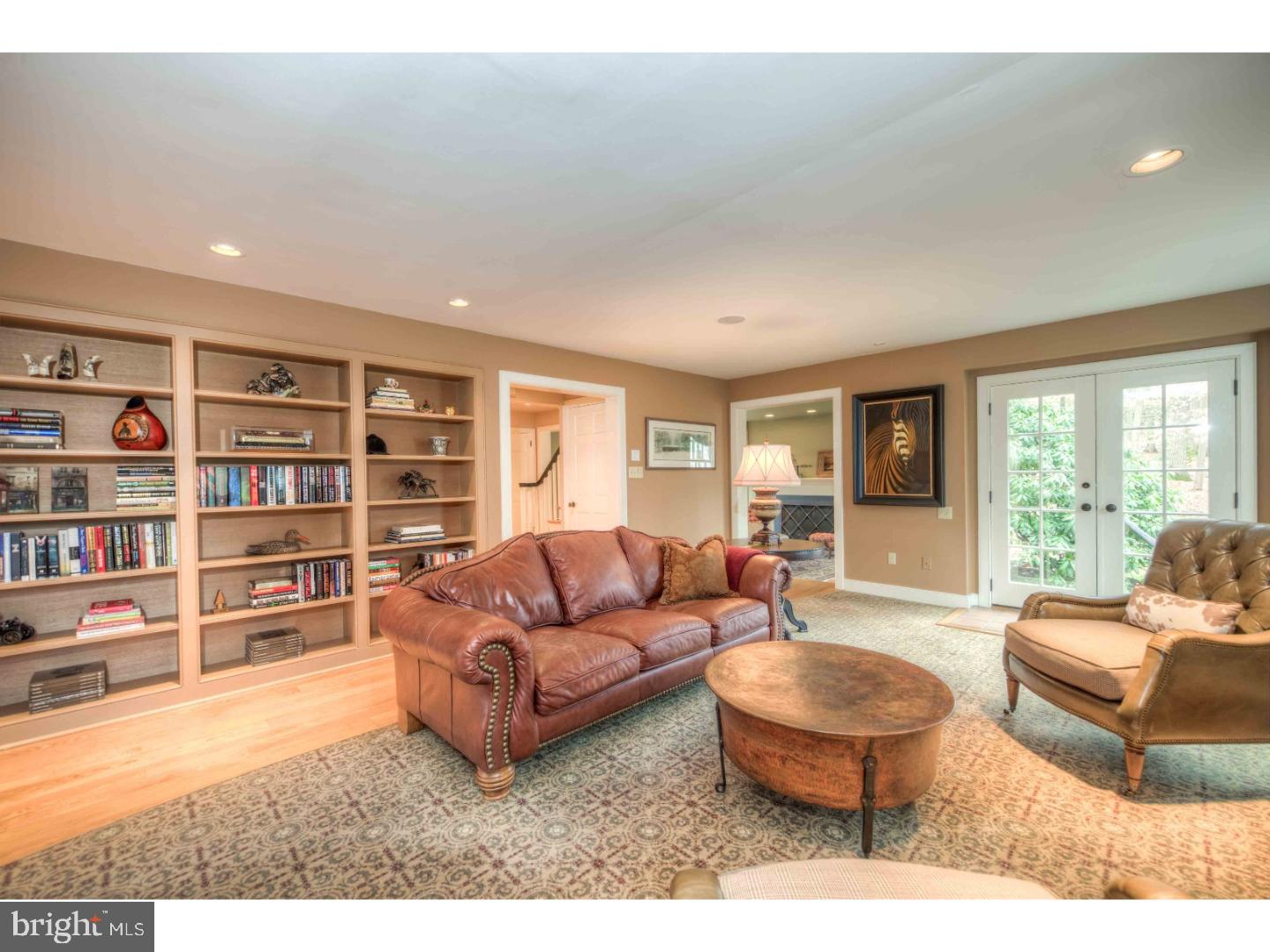 2 Dewitt Lane Wayne, PA 19087 - Photo 8 of 25 a living room with furniture and a book shelf