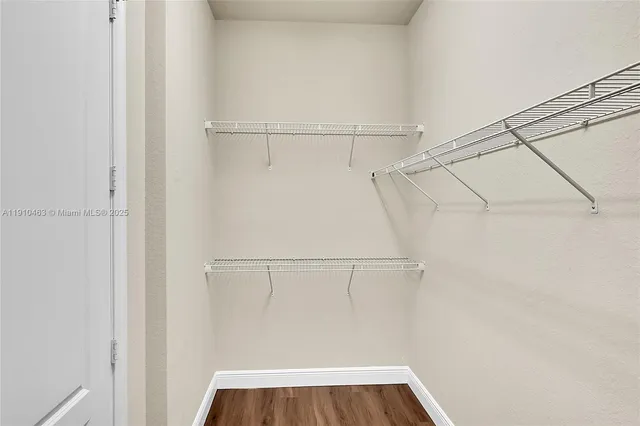 a view of a room with racks on the wall