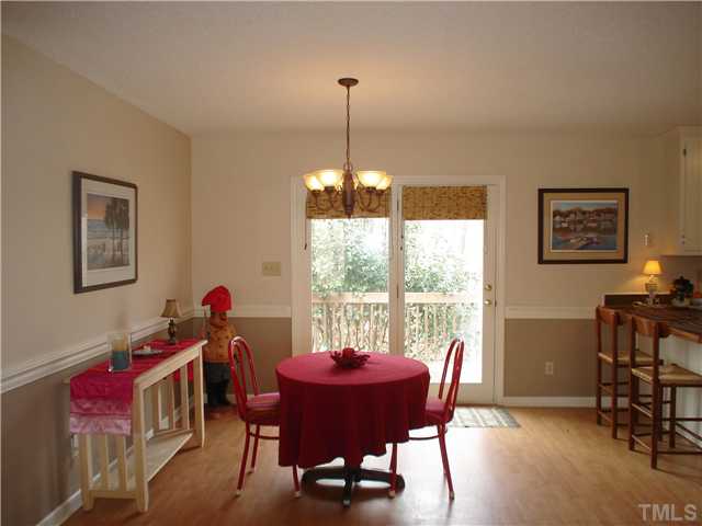 6921 Russell Road Durham, NC 27712 - Photo 3 of 12 a dining room with furniture and window