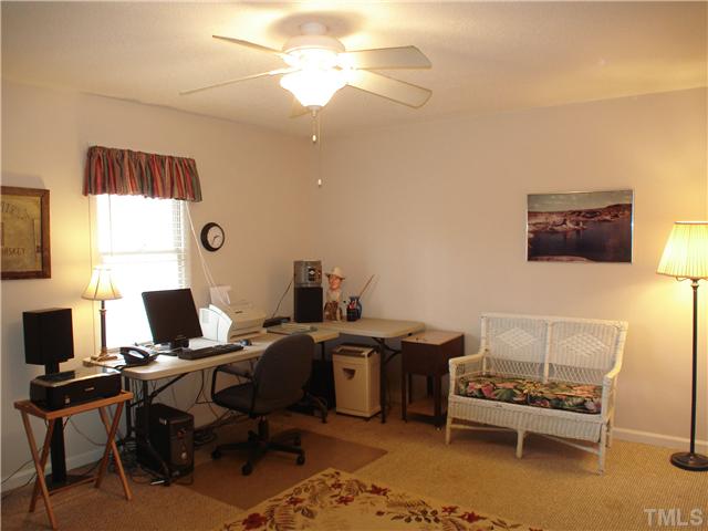 6921 Russell Road Durham, NC 27712 - Photo 8 of 12 a view of a workspace with a window