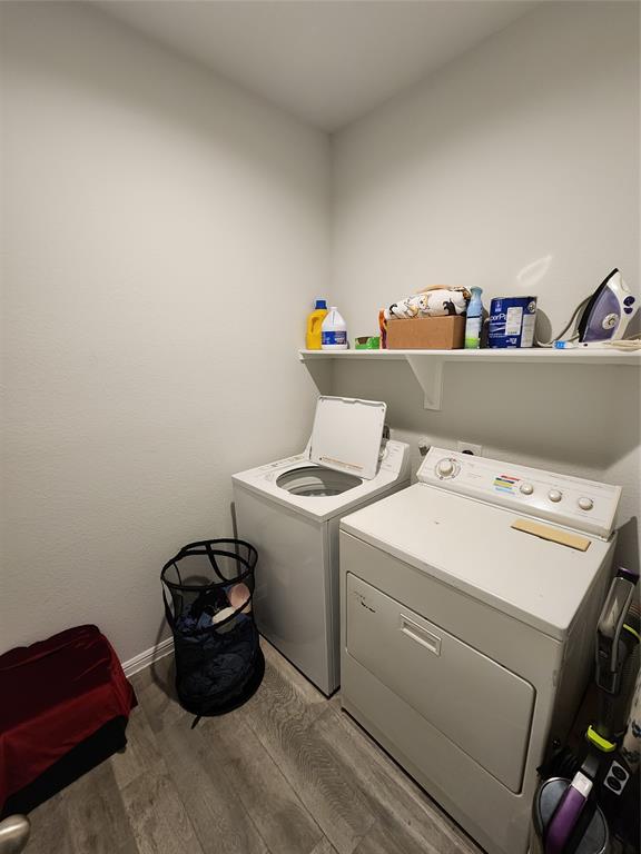 9240 Castorian Drive Fort Worth, TX 76131 - Photo 12 of 40 a utility room with dryer and washer
